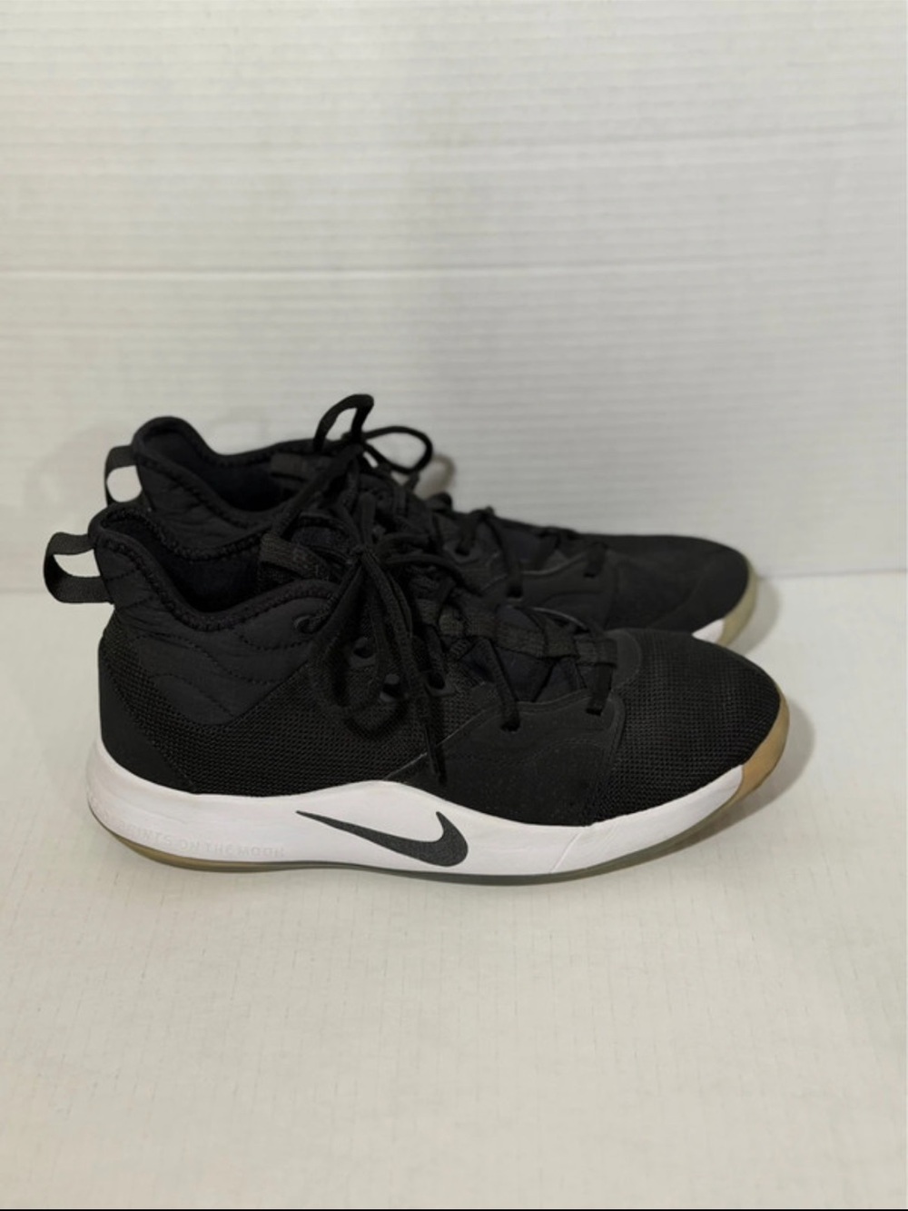 Nike Kids Black Sneakers with White Midsole and Gum Outsole